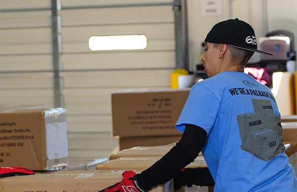 AMS warehouse employee working on inbound inventory