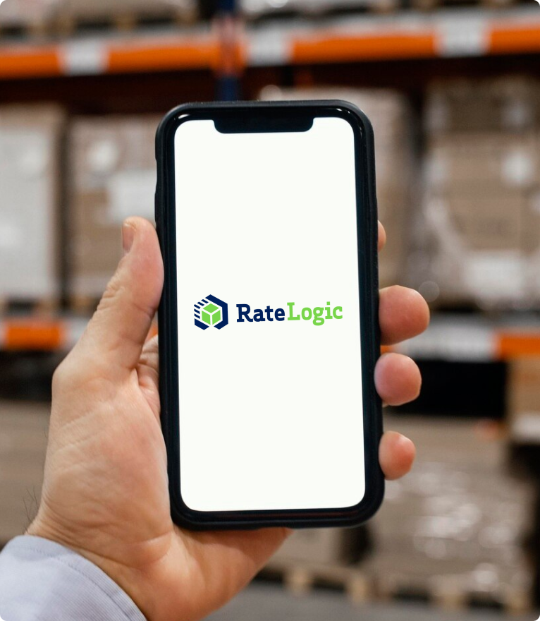 A phone being held, with the RateLogic app screen.