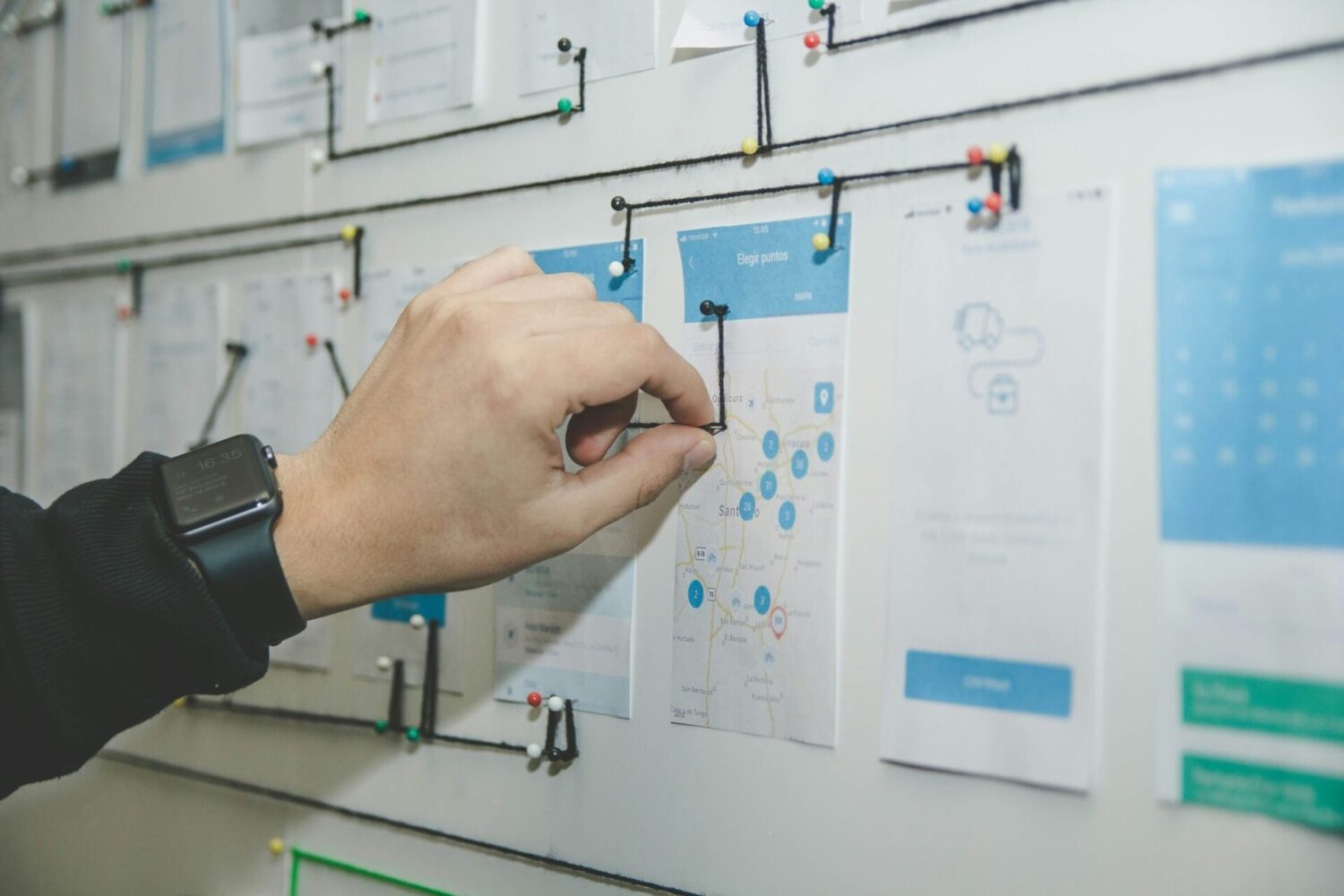 hand lining out page navigation strategy on a whiteboard - AMS Fulfillment