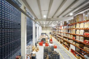 A warehouse aisle filled with various boxes.