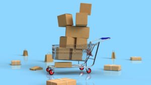 A shopping cart filled with and surrounded by packages and paper bags, with a light blue background.