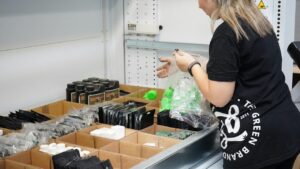 A person setting up a batch picking station.