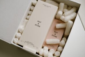 A package that contains a body wash and deodorant from the brand Salt & Stone.